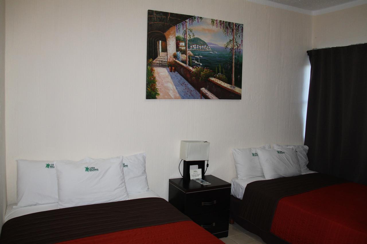 Hotel Villa Murano Puerto Arista Exterior photo